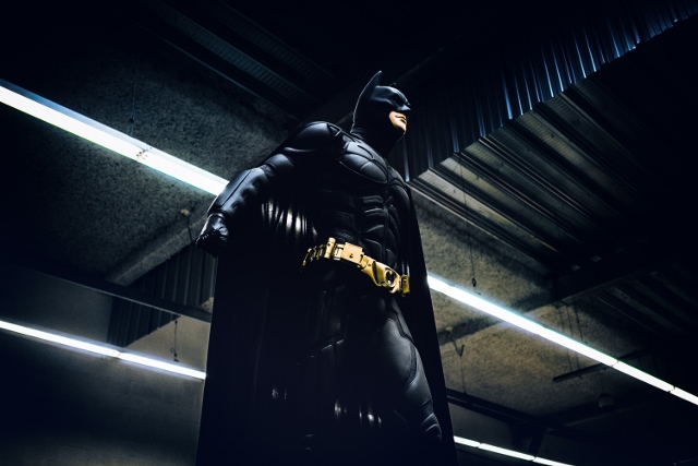 batman standing in industrial building