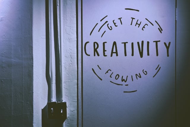 wall art that says 'get the creativity flowing'