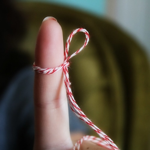 string tied around finger as a reminder