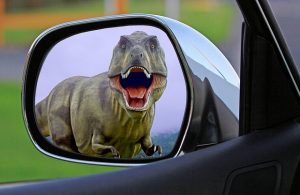 dinosaur in rear-view mirror