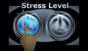 stress level buttons with finger hovering over 'off'